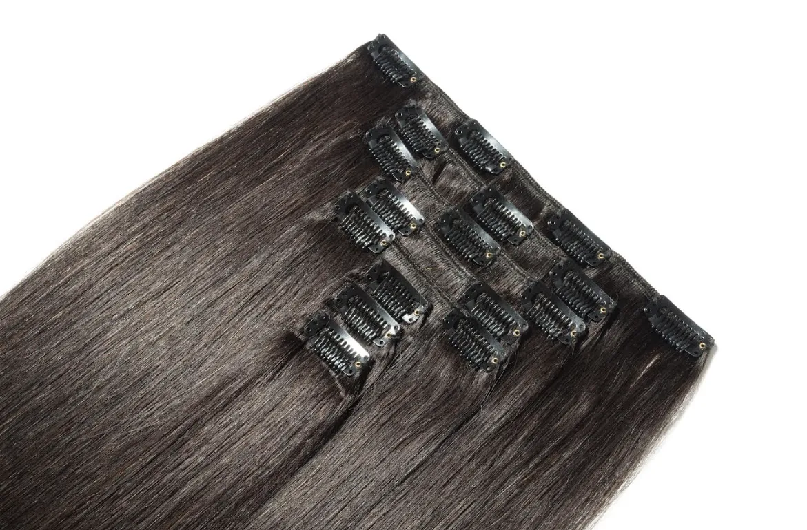 Natural looking human hair extensions in a rich, dark brown shade. Achieve high quality real hair volume effortlessly.