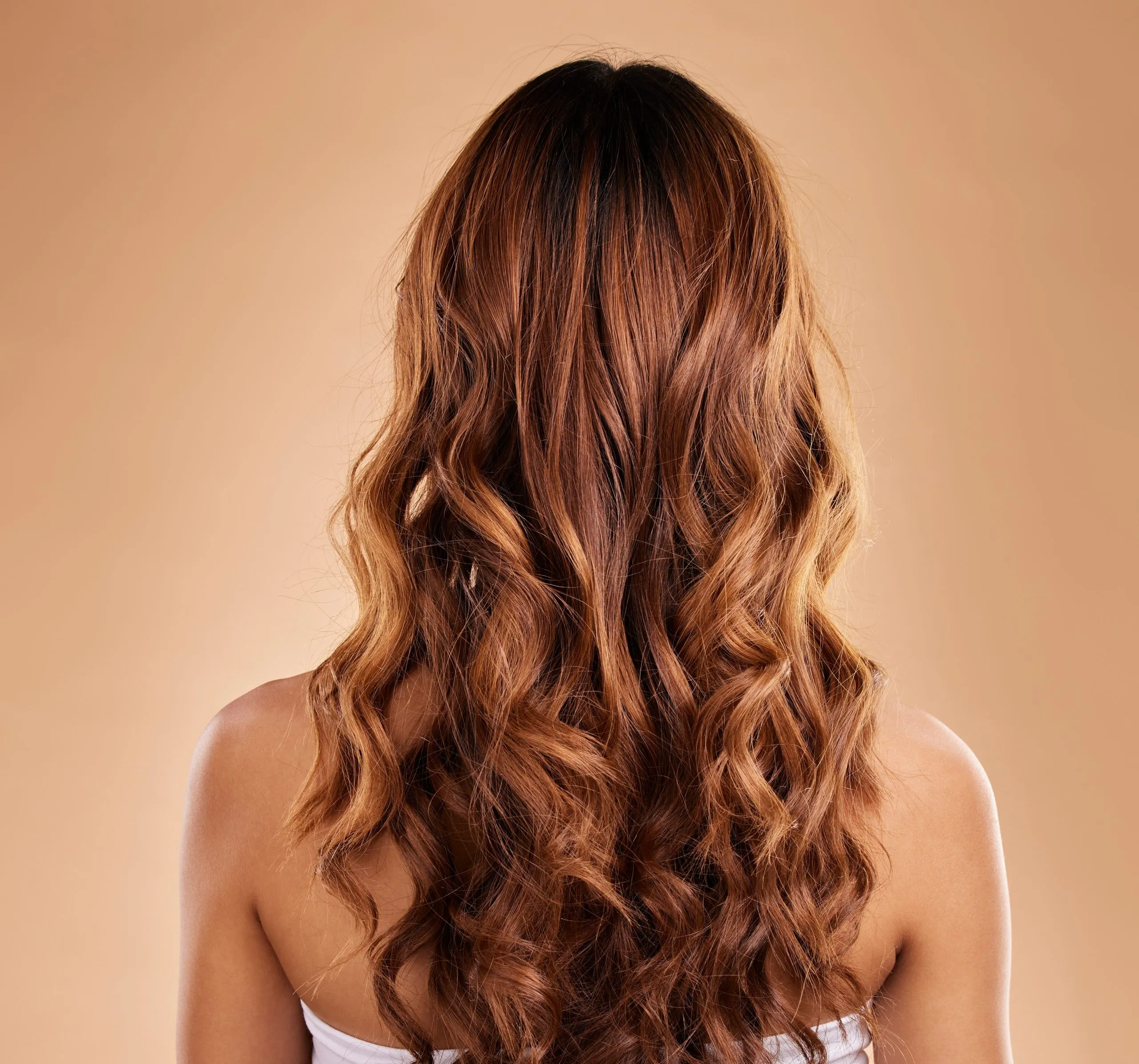 Natural looking human hair extensions, wavy style.