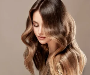 Natural looking human hair extensions in a rich, dark brown shade. Achieve high quality real hair volume effortlessly.